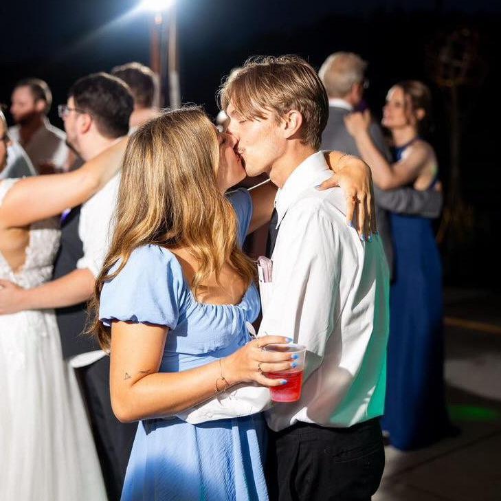 Dancing together at a wedding!