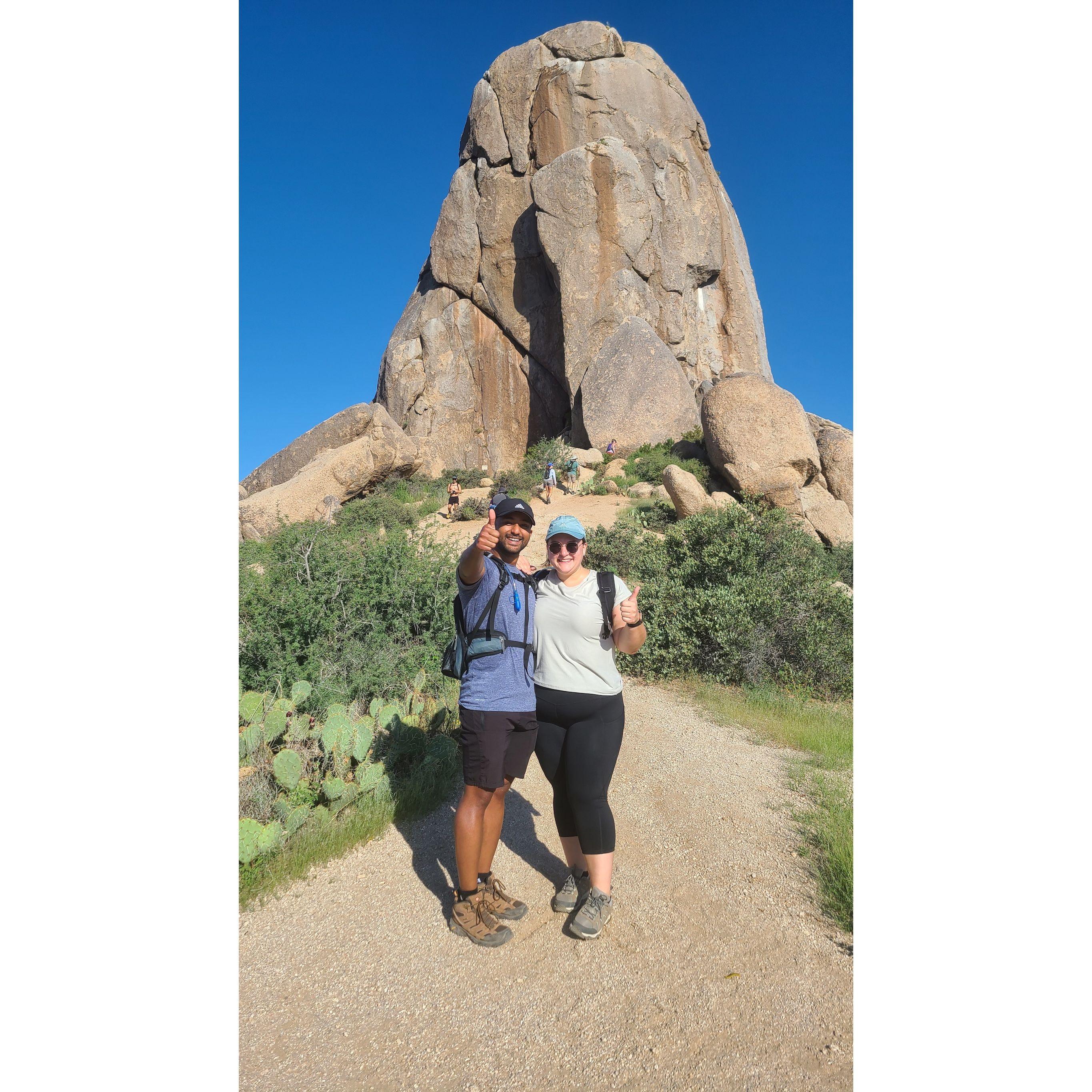 Does it look like a thumb in the background? I guess it belongs to Tom