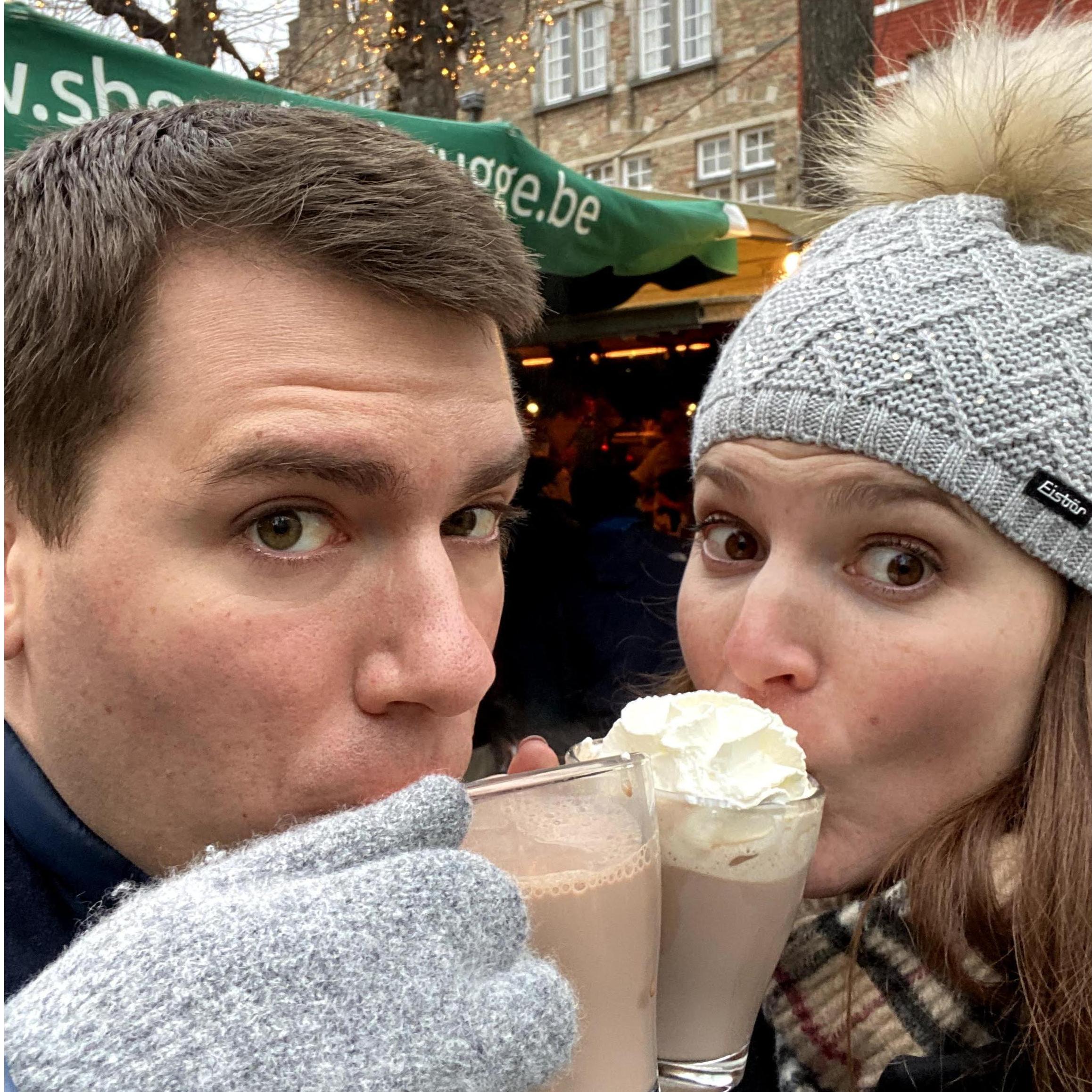 We stopped for hot chocolate at a Christmas market after Jon proposed in Bruges.