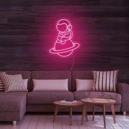 Astronaut Sitting On Planet Neon Sign MNC41218