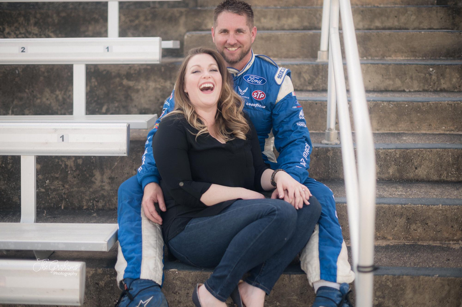 Shows how much of a trooper Cortney is, to put up with engagement photos at the track!