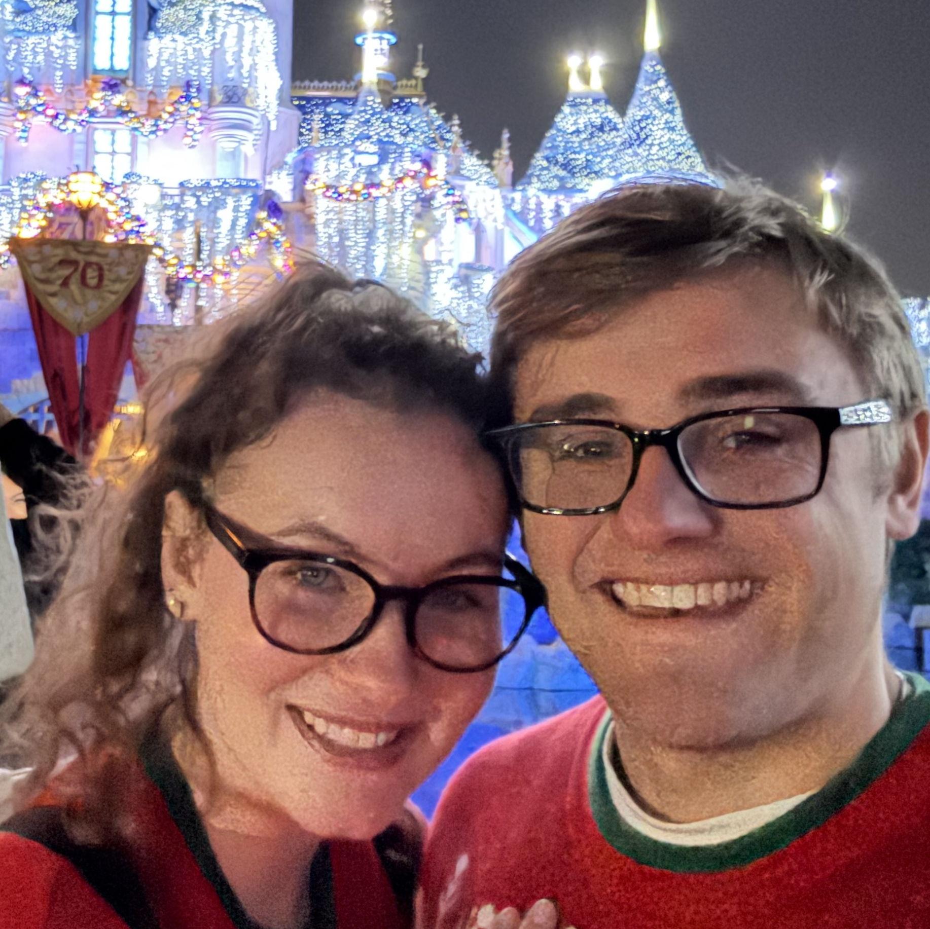 Embracing the matching-sweater-christmas-disney-magic.