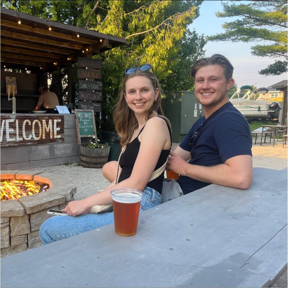 Enjoying the outdoor music and a beer at DCBC in Baileys Harbor. August 2023.