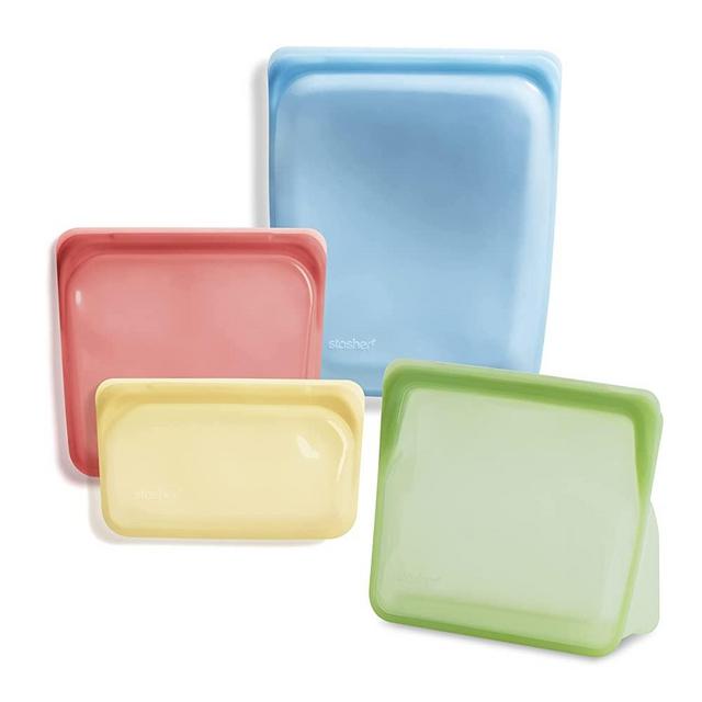 Stasher Silicone Reusable, Bundle 4-Pack Large Food Meal Prep Storage Container | Lunch, Travel, Makeup, Gym Bag | Freezer, Oven, Microwave, Dishwasher Safe, Leakproof, Classic Rainbow