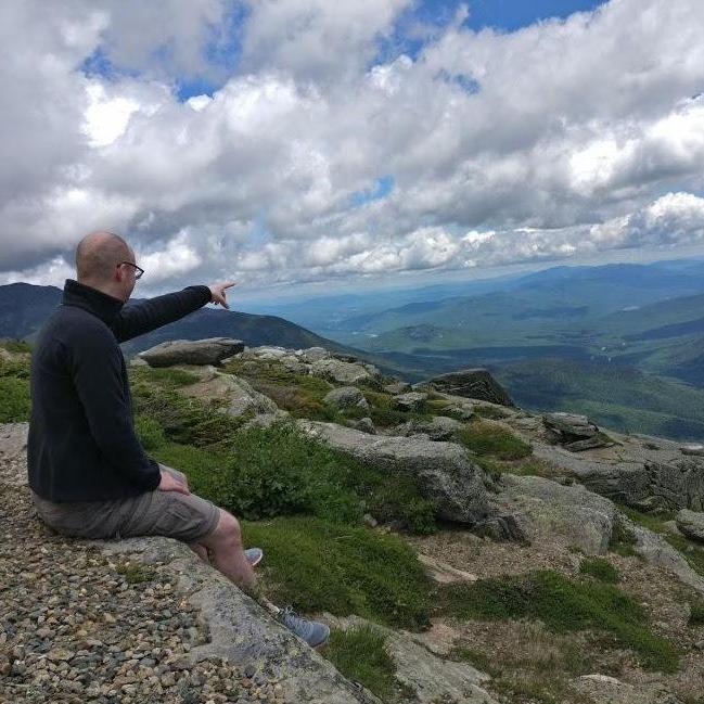 Patrick is enjoying the view at the top of Mt. Washington.