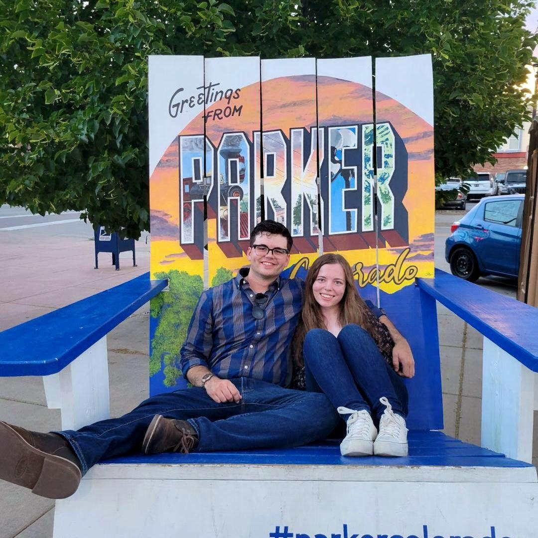 Our first double date spent exploring mainstreet in Parker CO. Its a giant chair. They aren't that small.