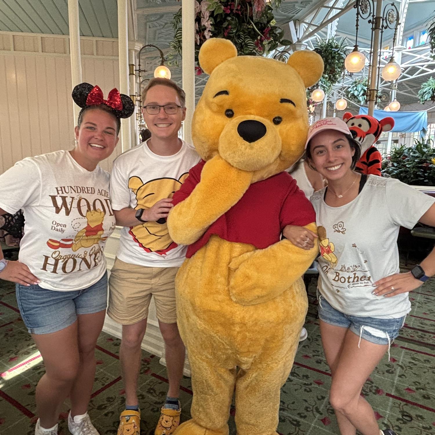 BFF Nikki and Sara brought Eric to Disney for his first time many years. Got to meet his favorite buddy Pooh Bear!