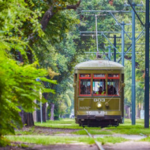 Ride the streetcar ($1.25) up St. Charles Ave.