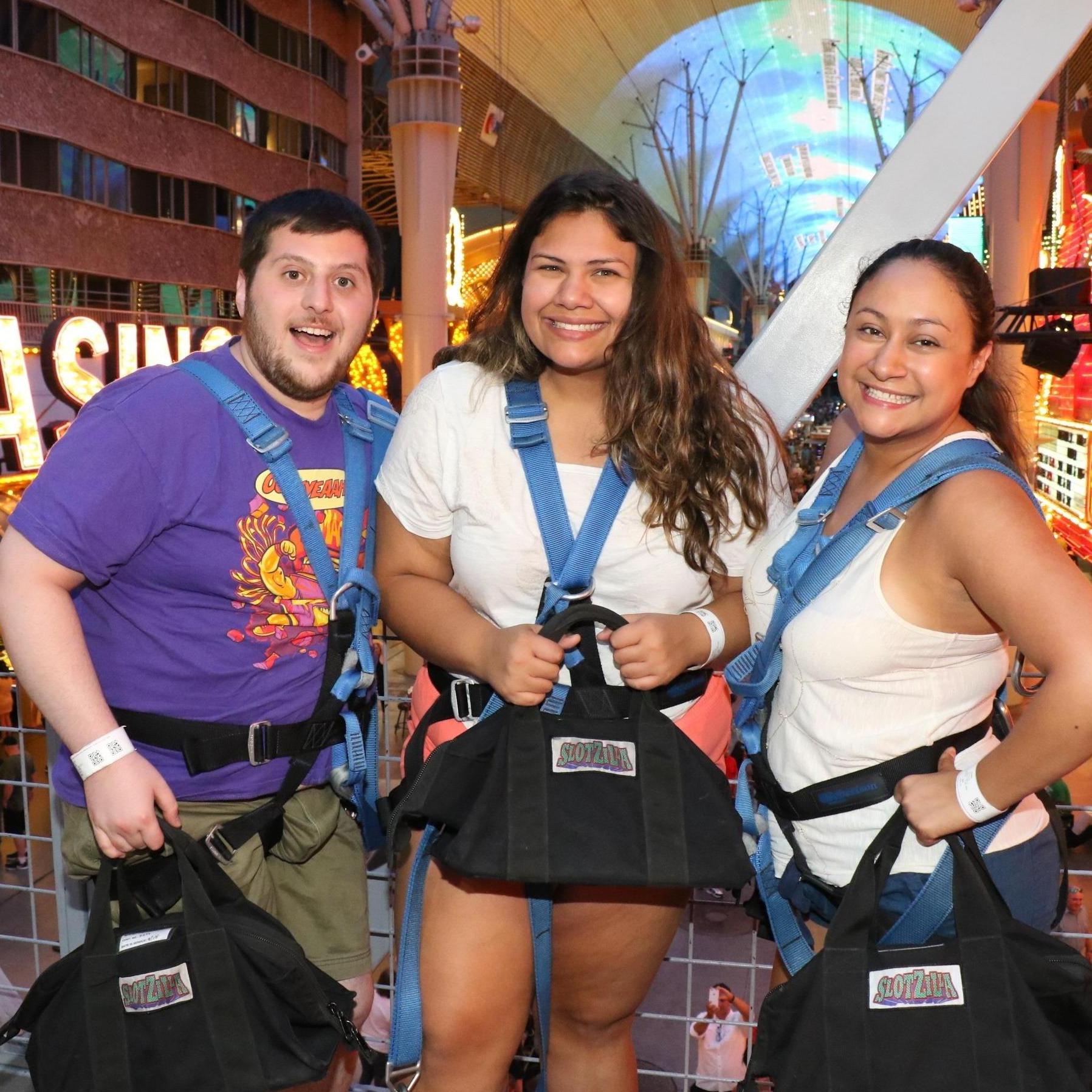 Ziplining down Fremont Street in Las Vegas with Dr. Gabby Aguilar aka Sister of the Bride!