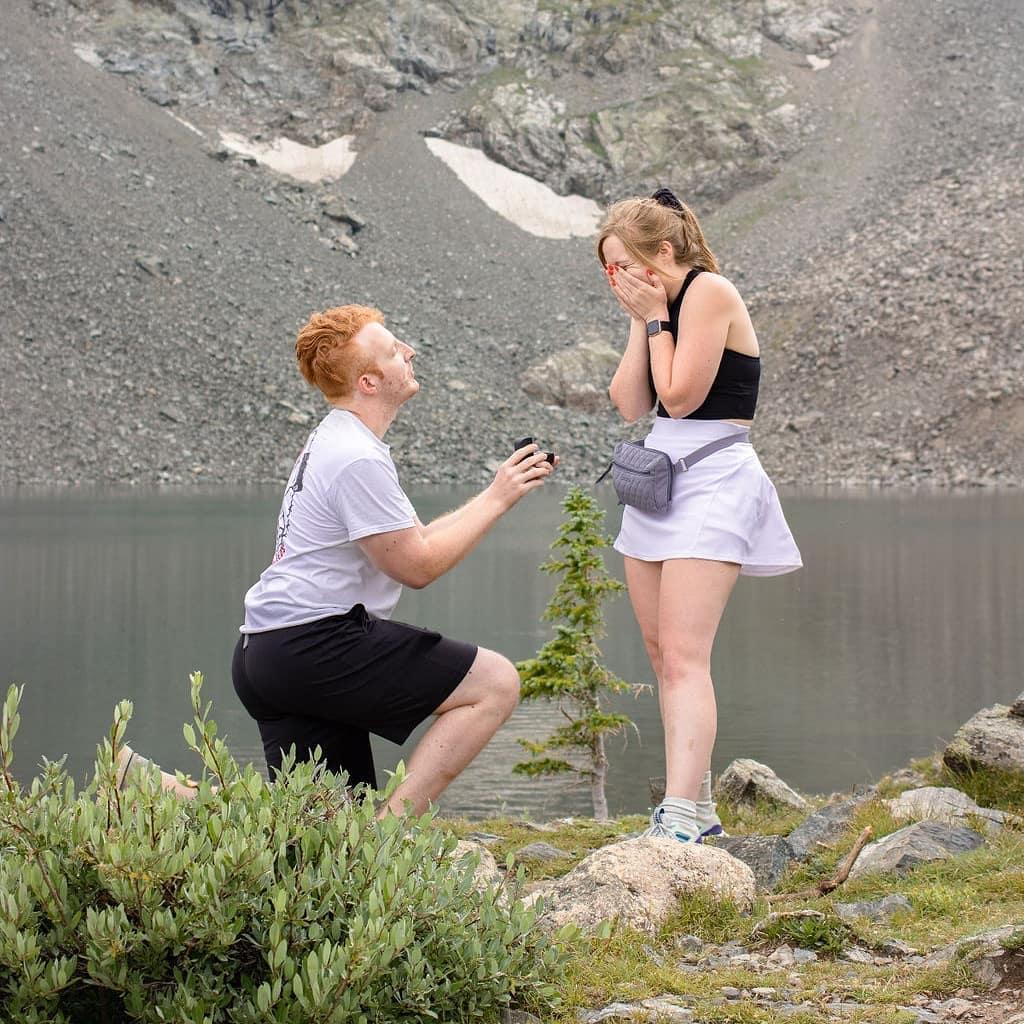 "The" proposal photo. About 3 minutes prior we were having to safely make distance between us and a family of wild mountain goats that seemed interested in us.