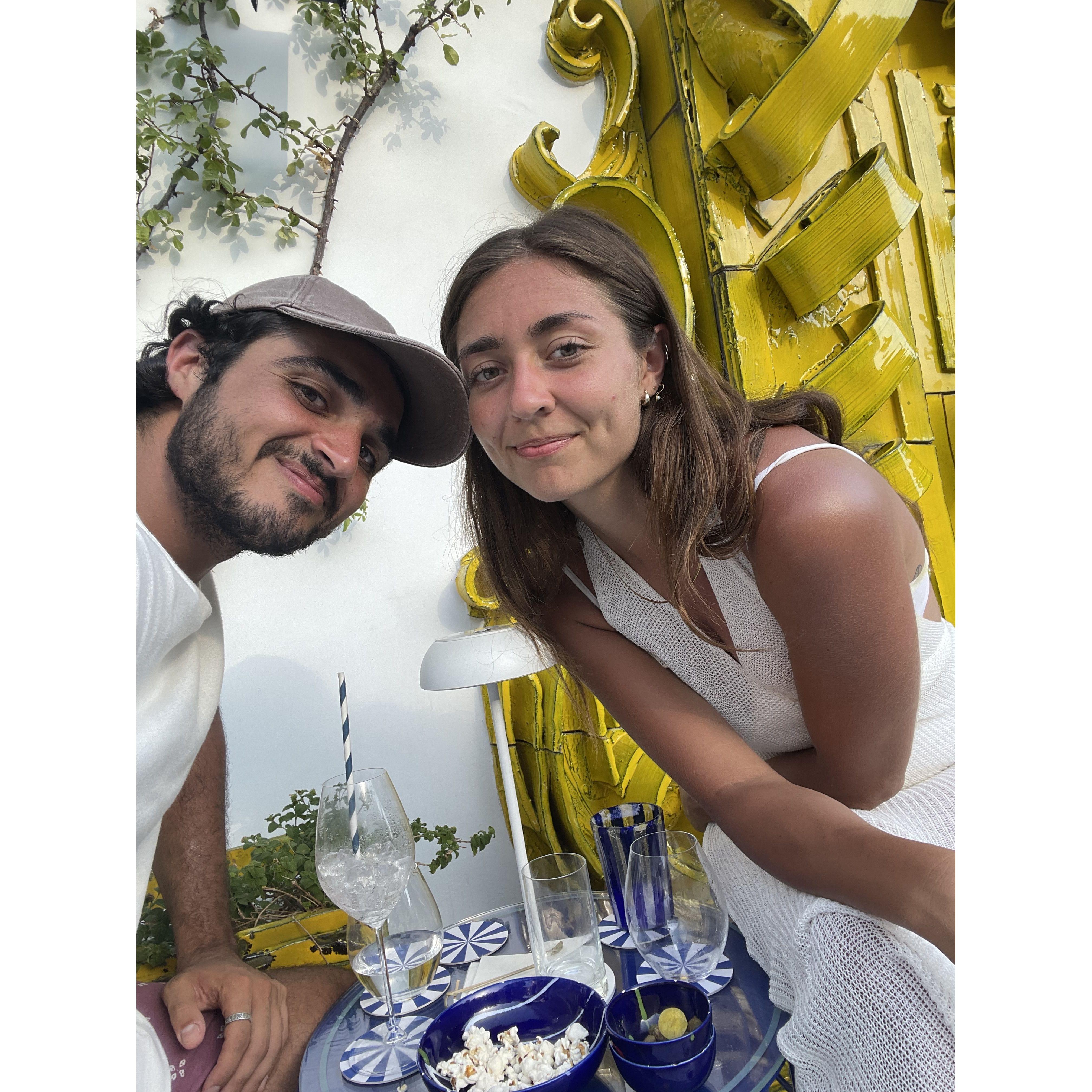 Here we are, very tan, at a fancy bar in Positano, Italy...