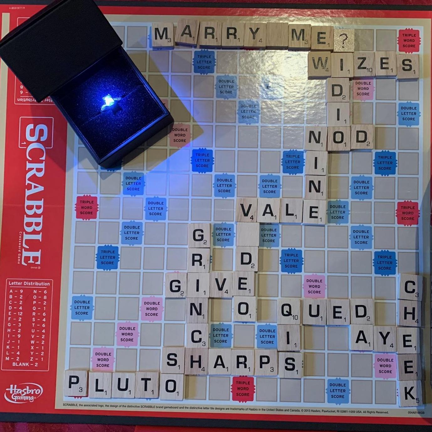 Our engagement Scrabble board