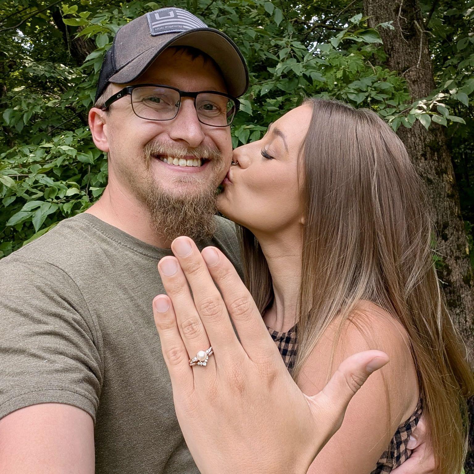 This was the announcement photo we used for friends and family to let them know we got engaged the night before.
