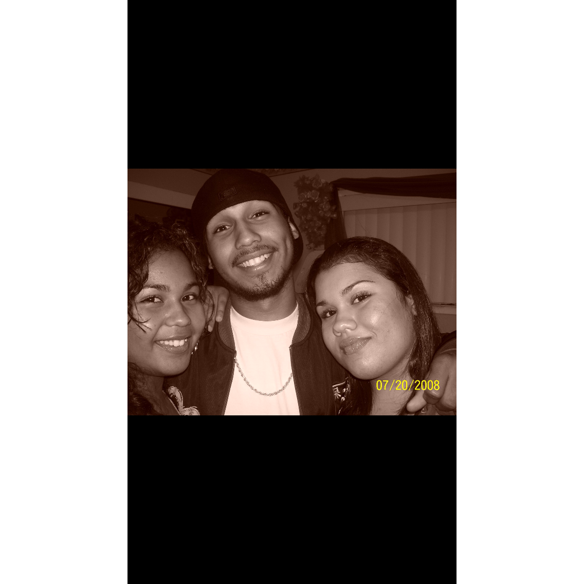 2008! High school freshman Nellee poses for a picture with brother (Matthew) and sister (Jaymee)