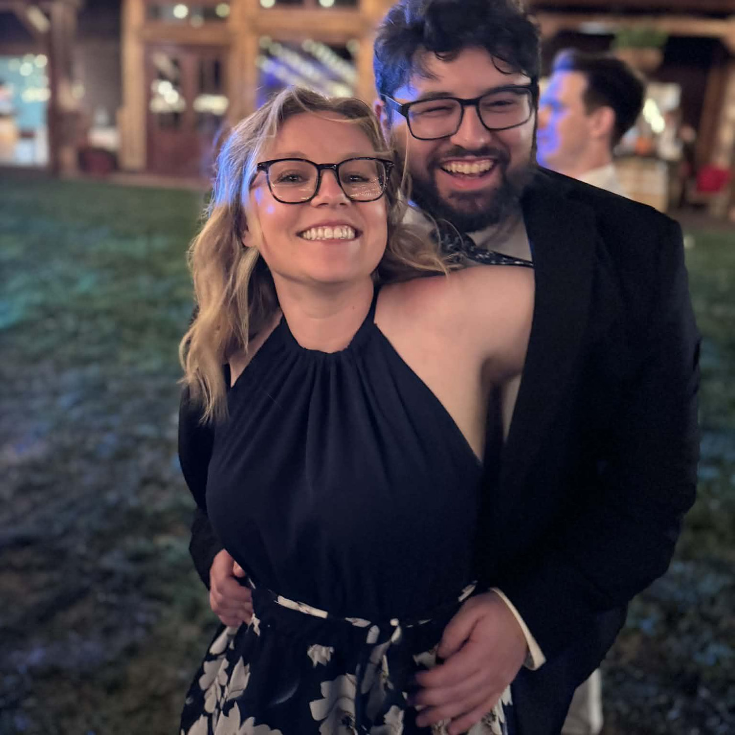 Taken together at a wedding (with a cameo from groomsman Dr. Brian Murillo Greene behind Joe).
