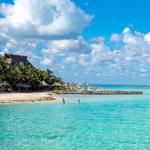 Visit Isla mujeres on a daytrip (great place for snorkel)