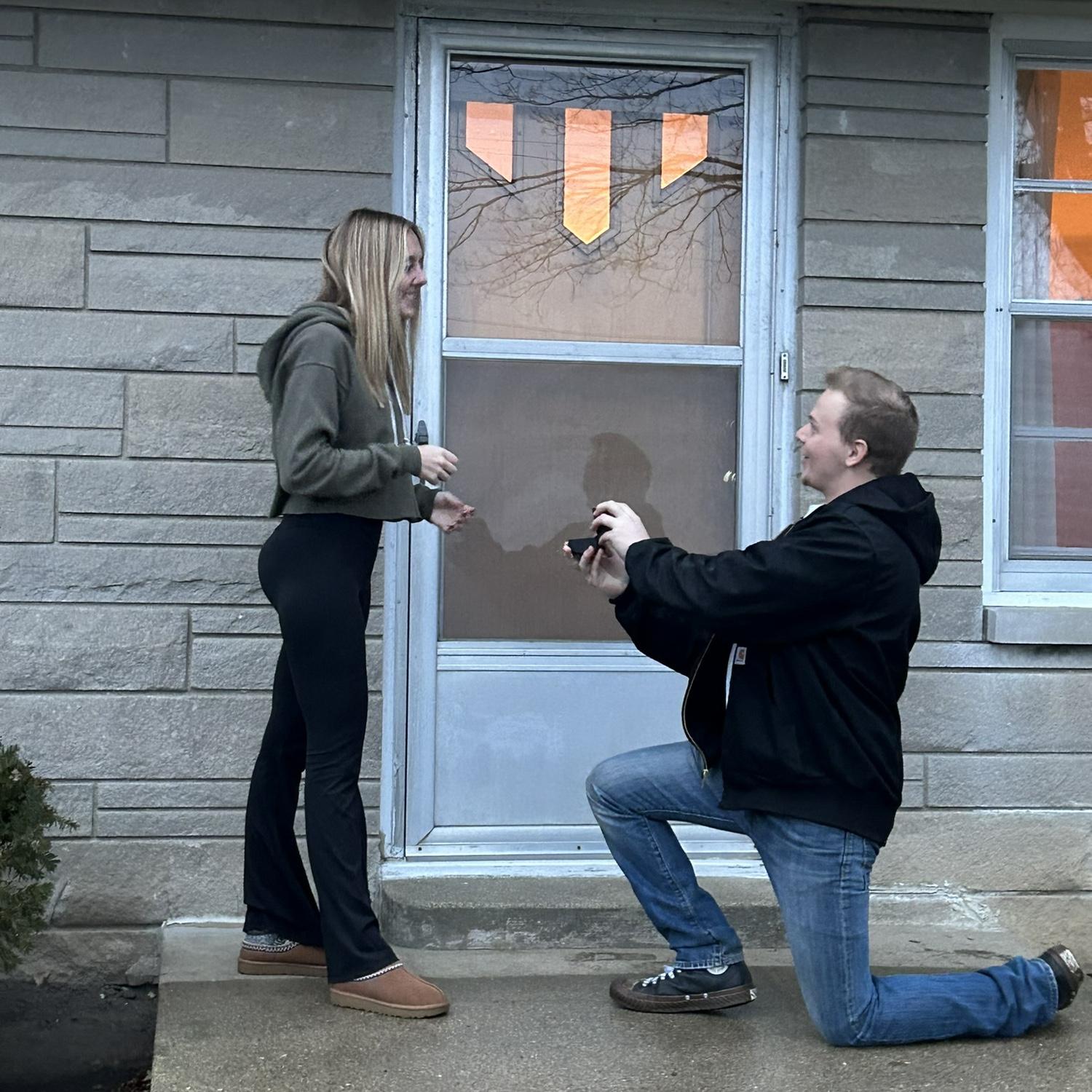 Proposal in front of our house we closed on that day as well🏡💍