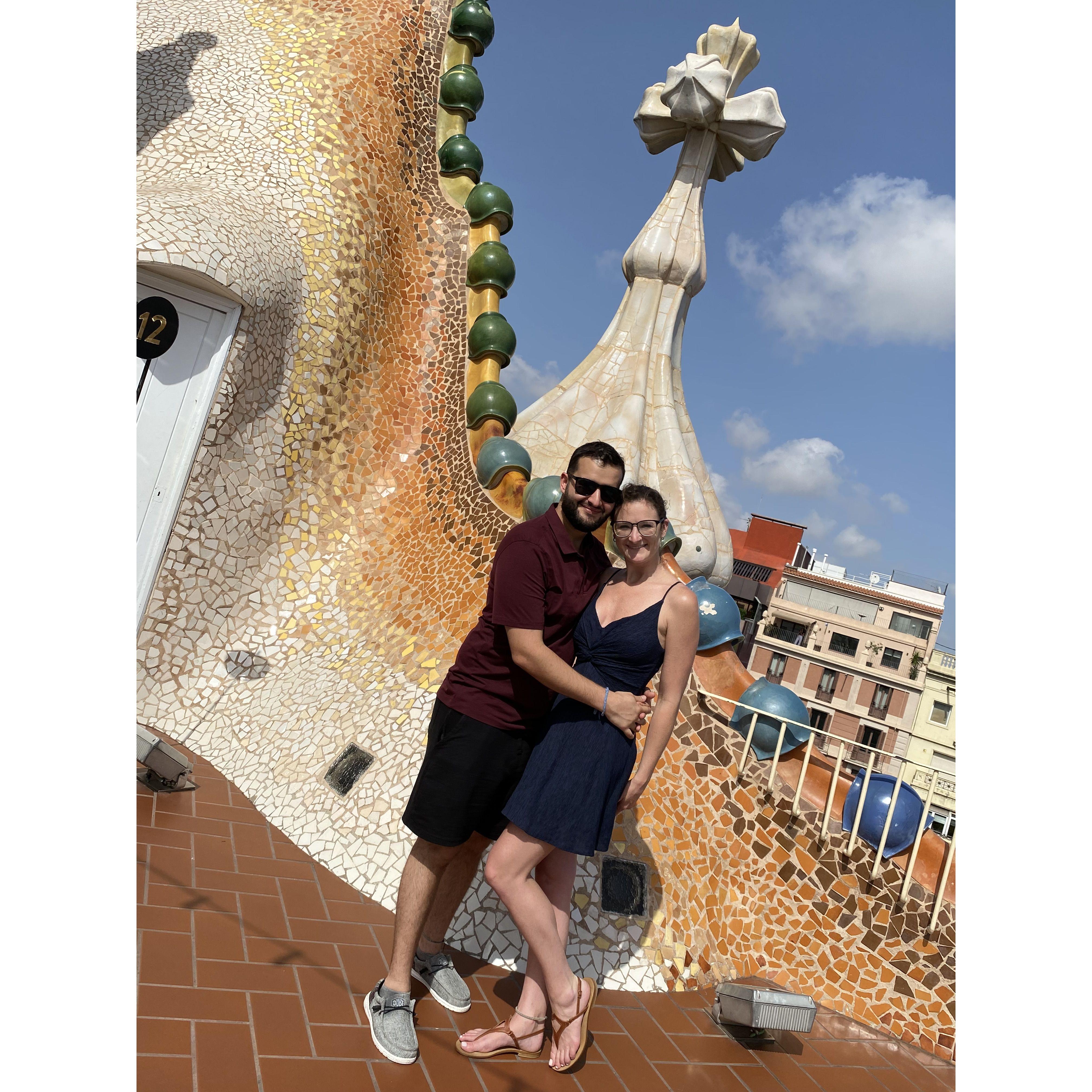 Quirky like us! Casa Batlio Building designed by the famous Antoni Gaudi in Barcelona, Spain. He's known for his unique architecture. The ridged structure behind us was representing a dragon's back.