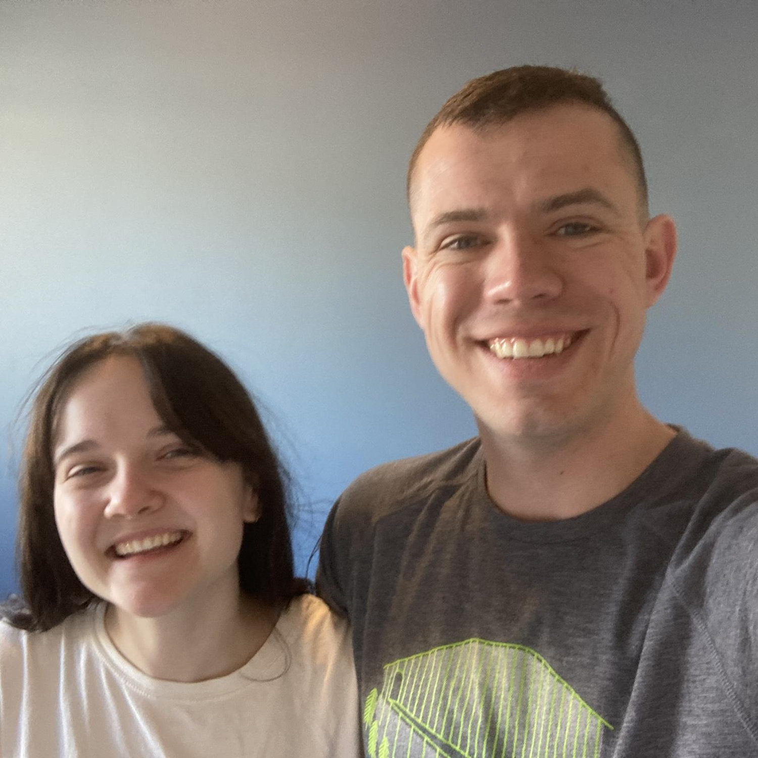 One of our first pictures as a couple - painting Parker’s brand new house!