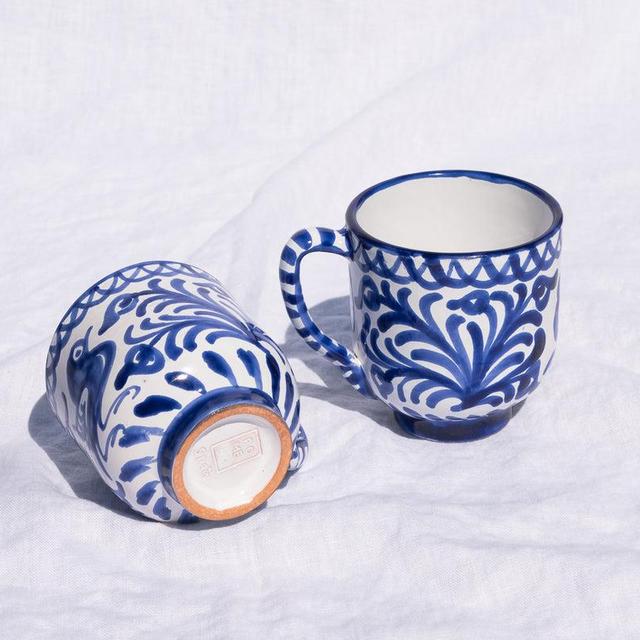 Mug with hand painted designs