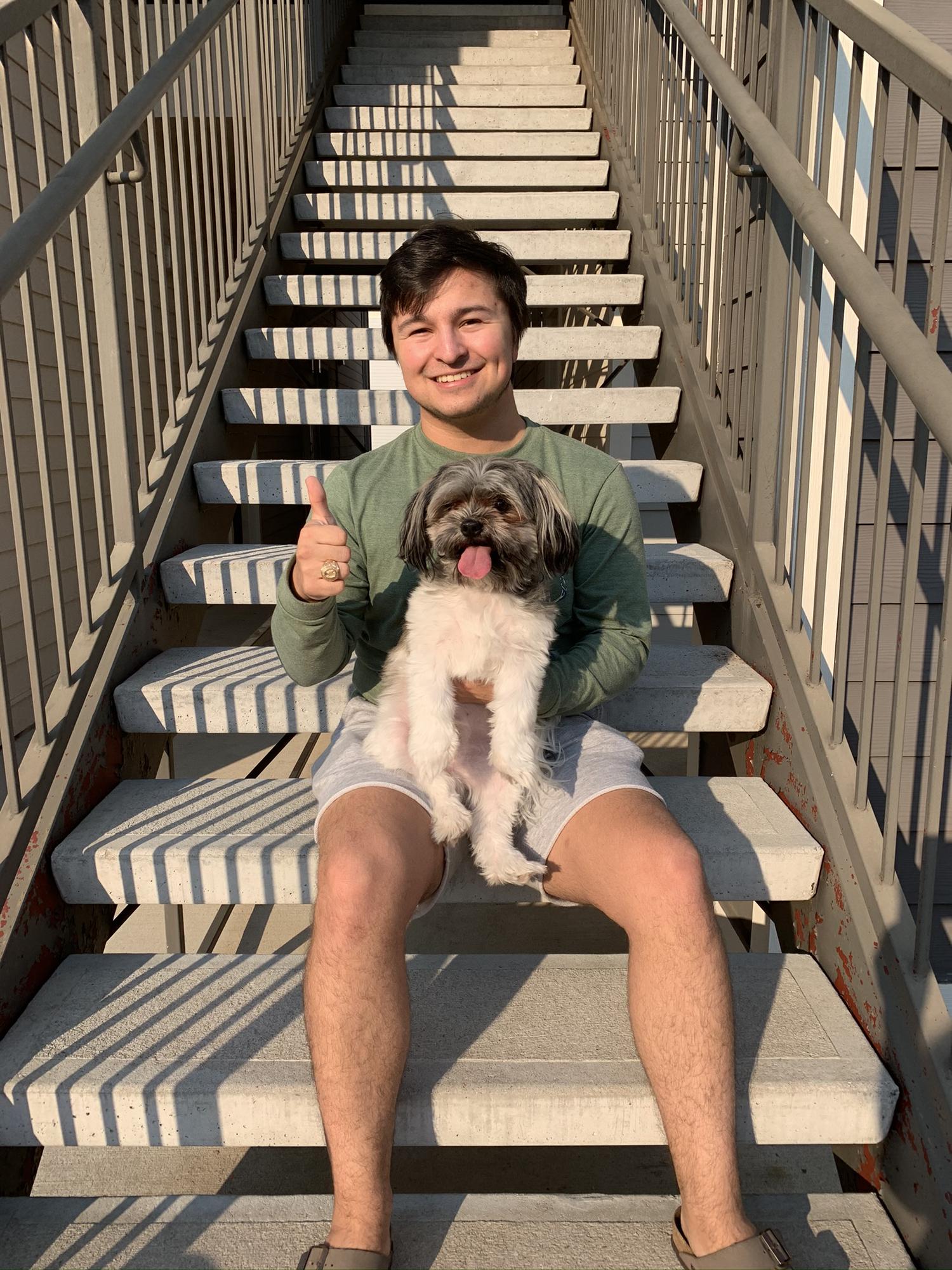 Jared with his Aggie Ring and ollie