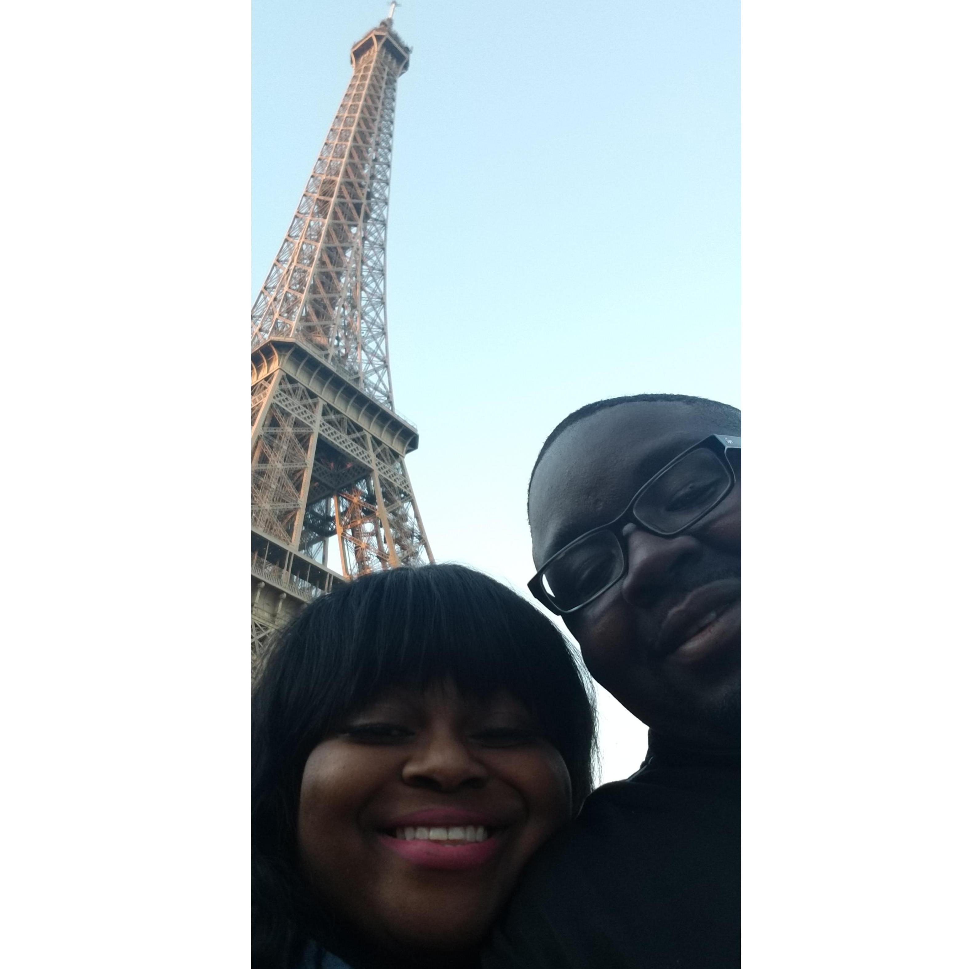 Working hard to get our faces and the Eiffel Tower in our picture!