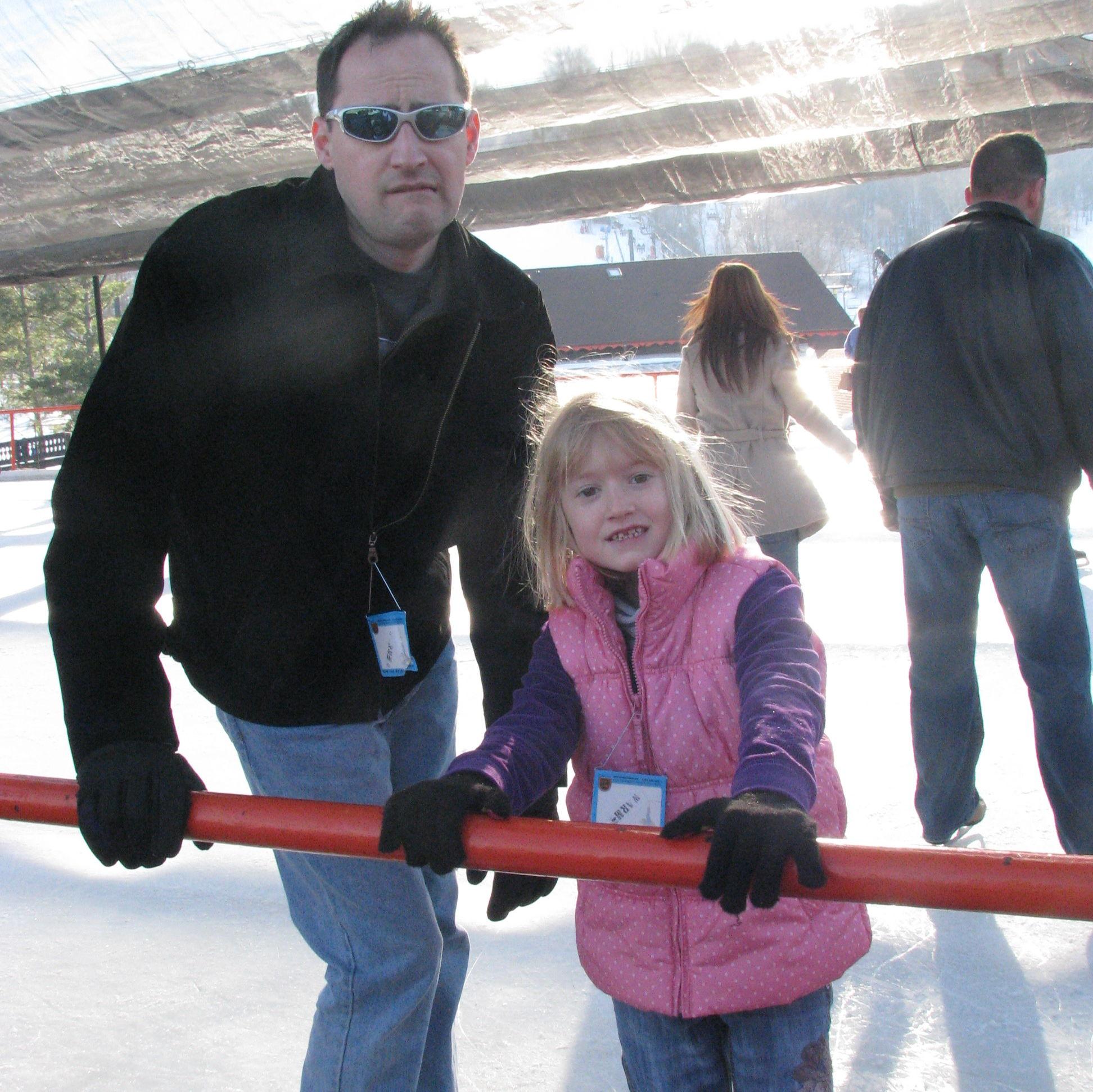The bride & her dad ice skating