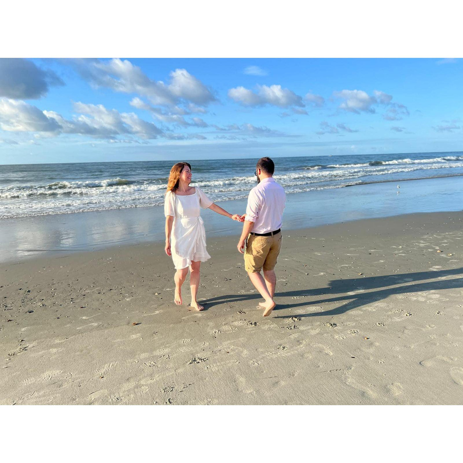 It was a beautiful morning by the sea; a couple of passersby clapped when she said yes!