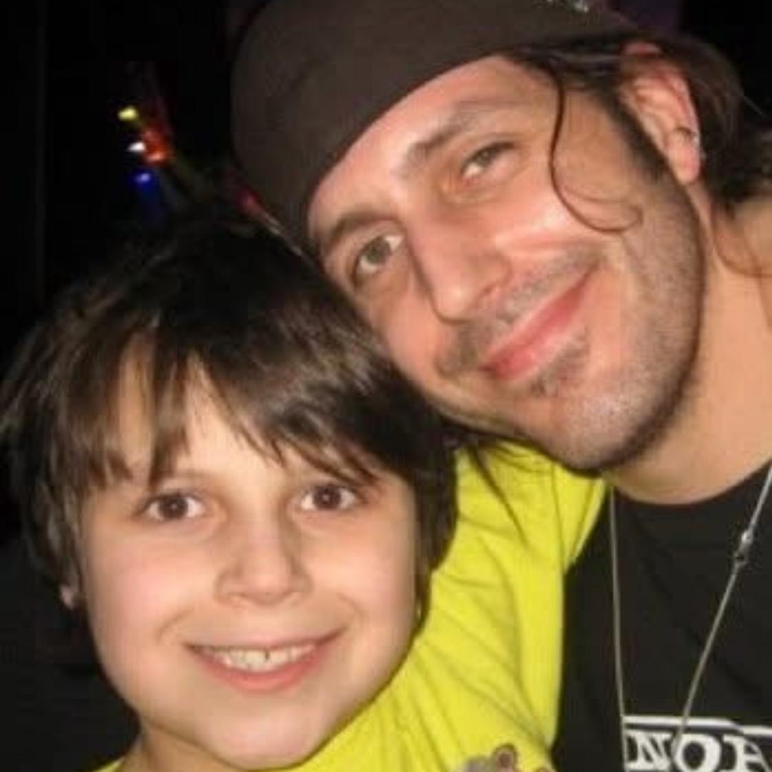 Gabe + Macklin center stage at a concert