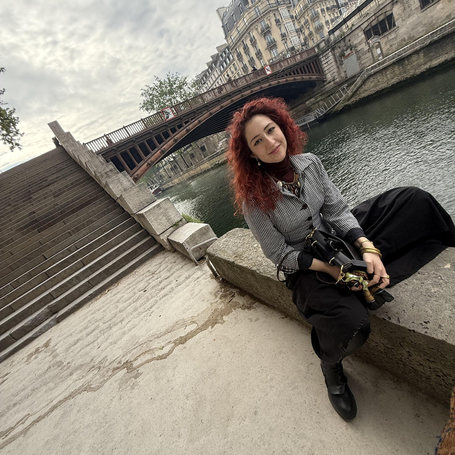 Along the Sienne on our first day in Paris, Josie stunting on the business casual Parisians (2025)