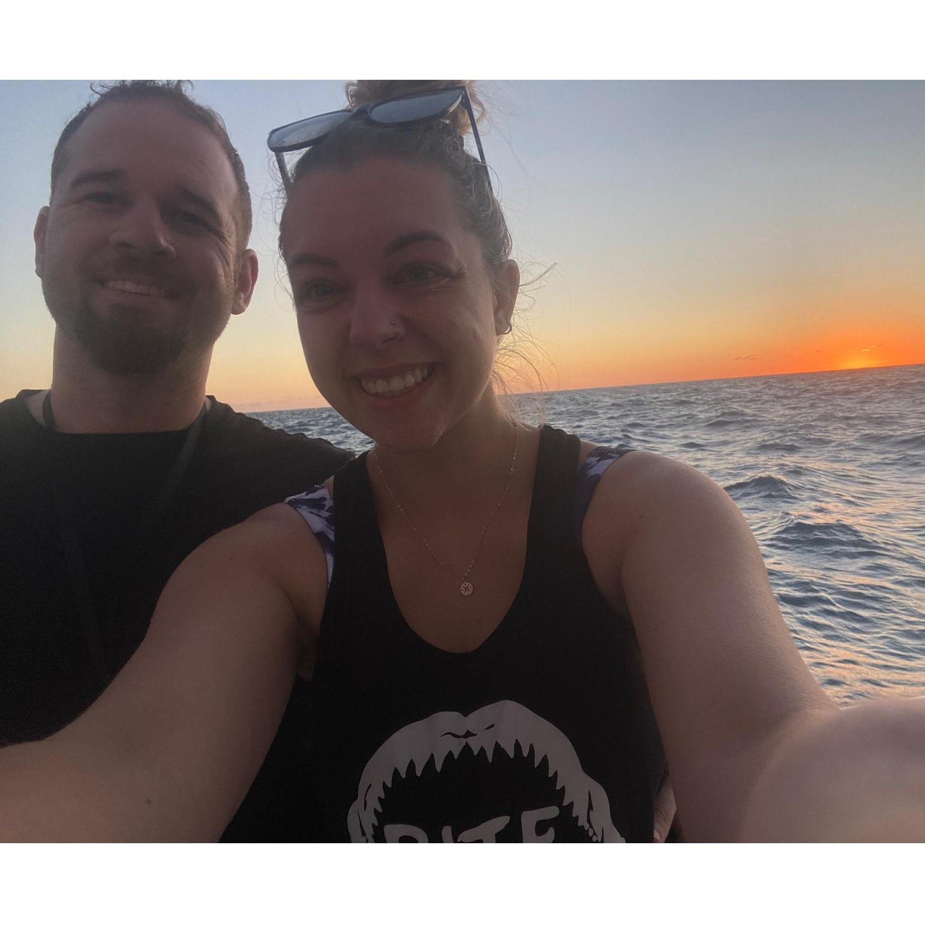Sunset boat ride before diving with Manta Rays!