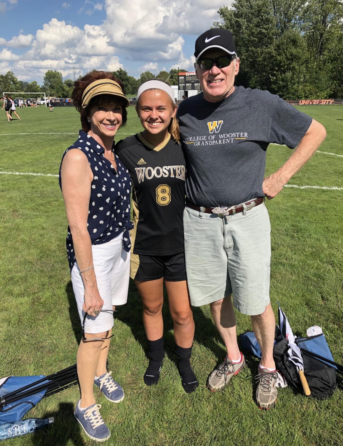 Grammy and Papa watching Madison play soccer