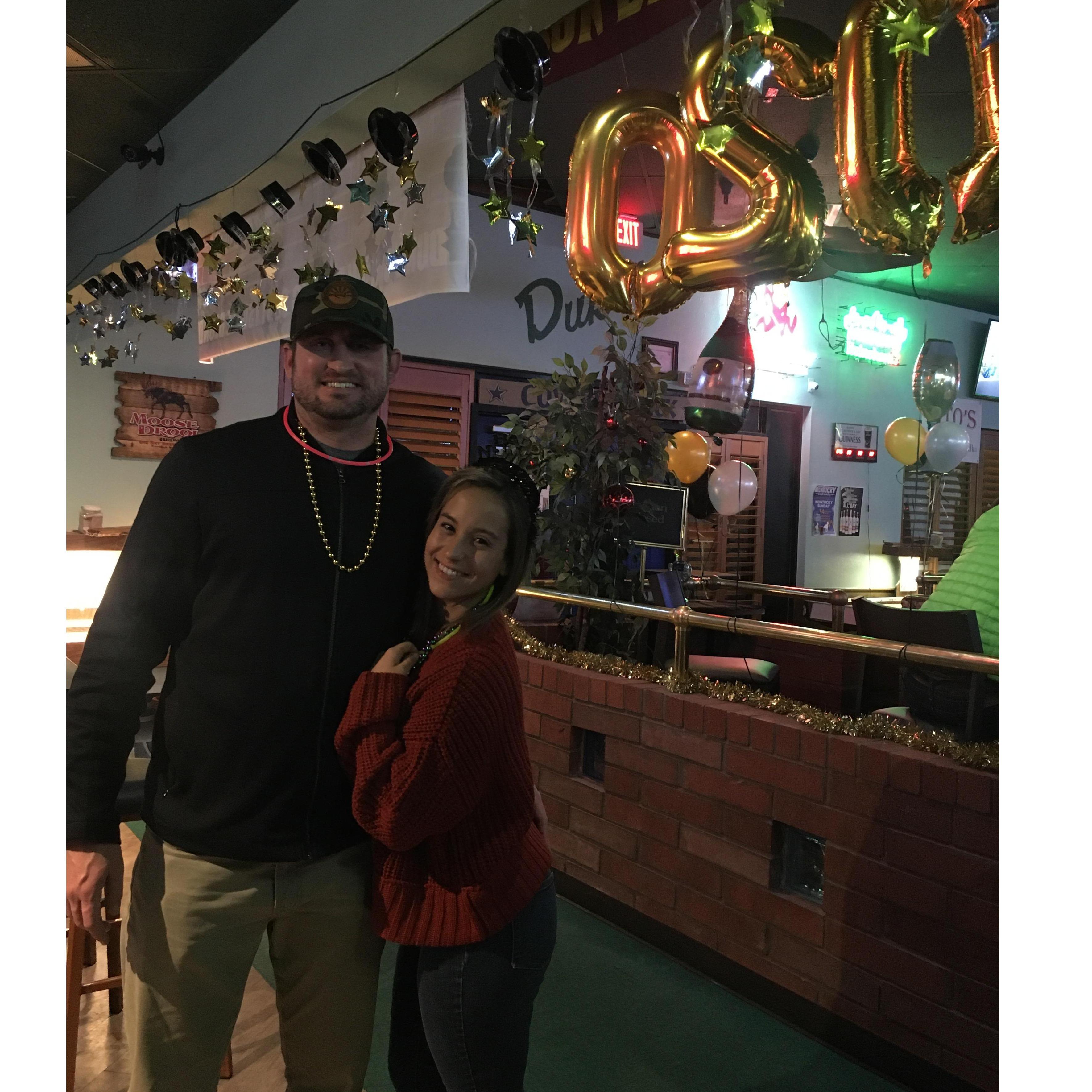 Celebrating our first NYE together at the dive bar where we had our first date.