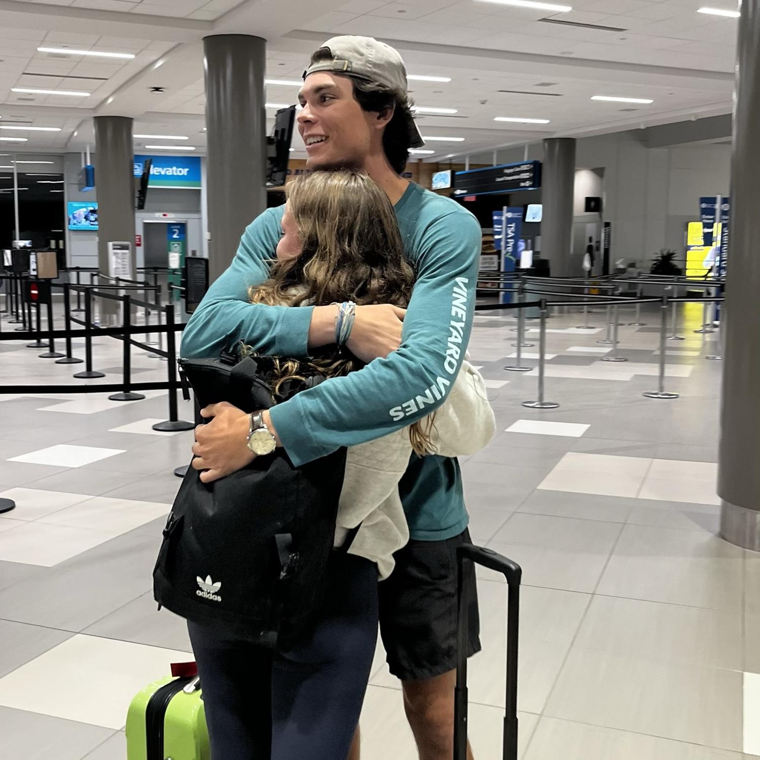 July 2023 - Greeting at the airport after over a month of long distance.