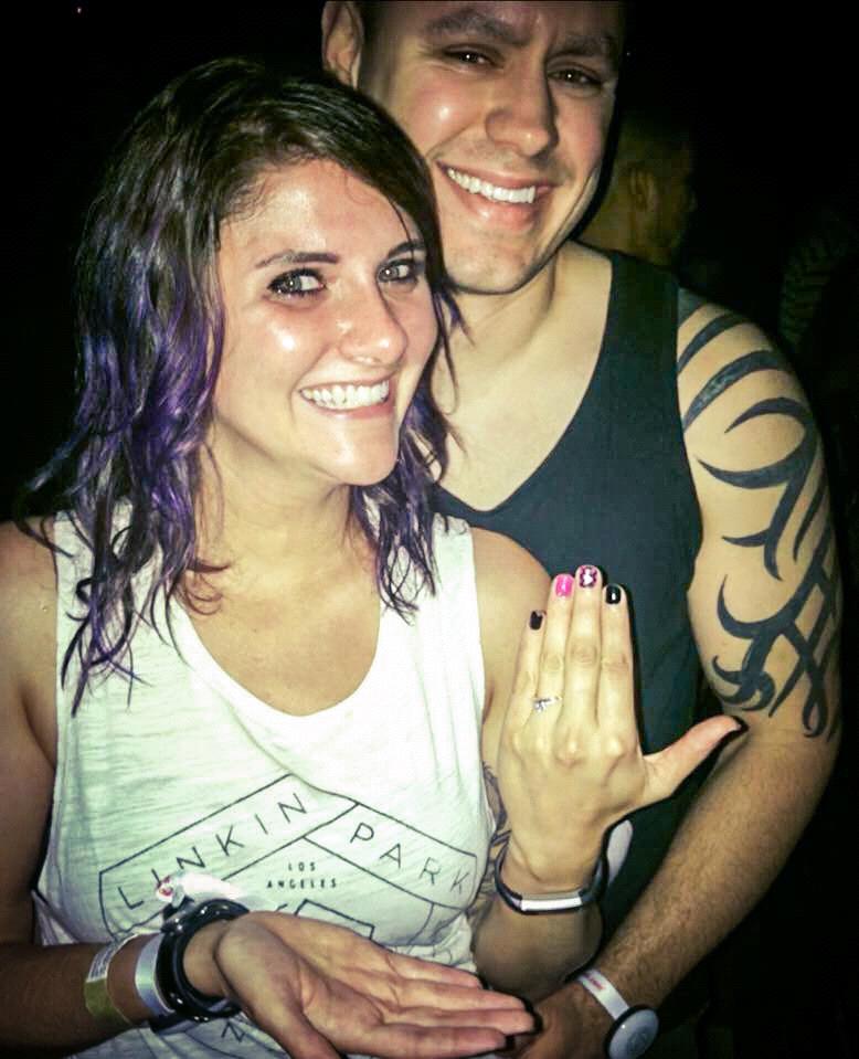 Right after he asked me to marry him! The strangers next to us demanded to take a picture.