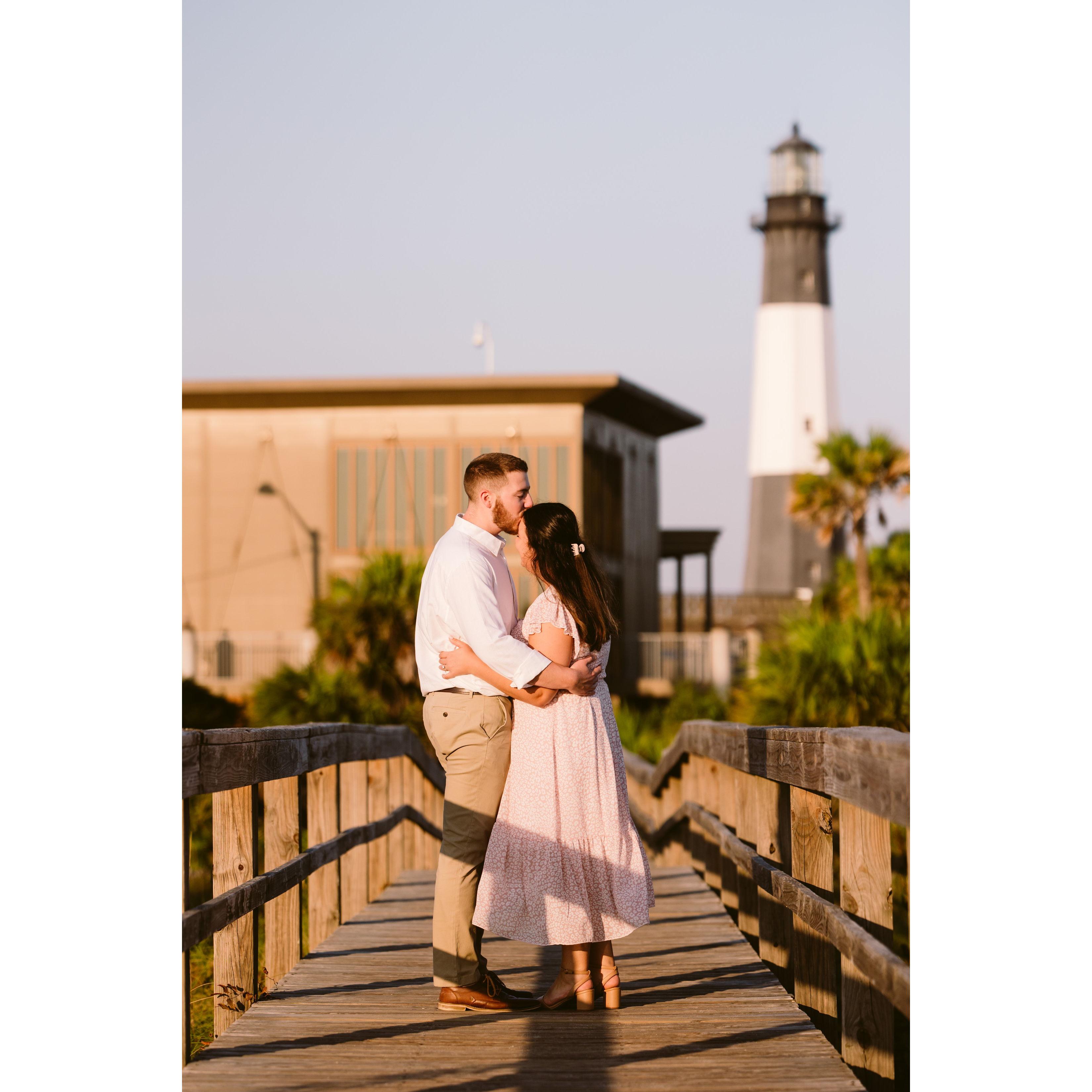 A picture from our engagement photoshoot on the boardwalk where Sean proposed at Tybee Island in 2023