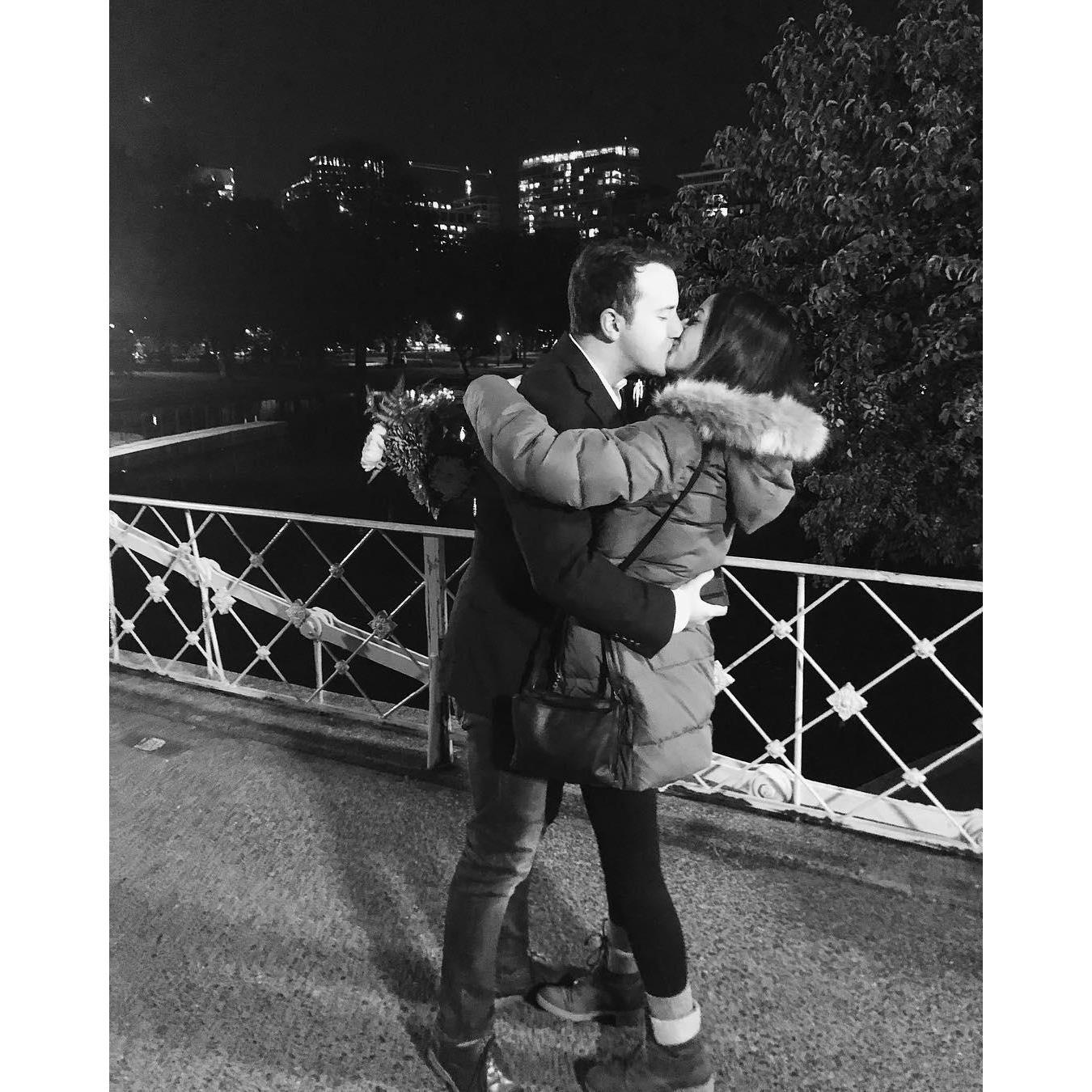 Candid kiss after Ryan proposed on the bridge in Boston Common.