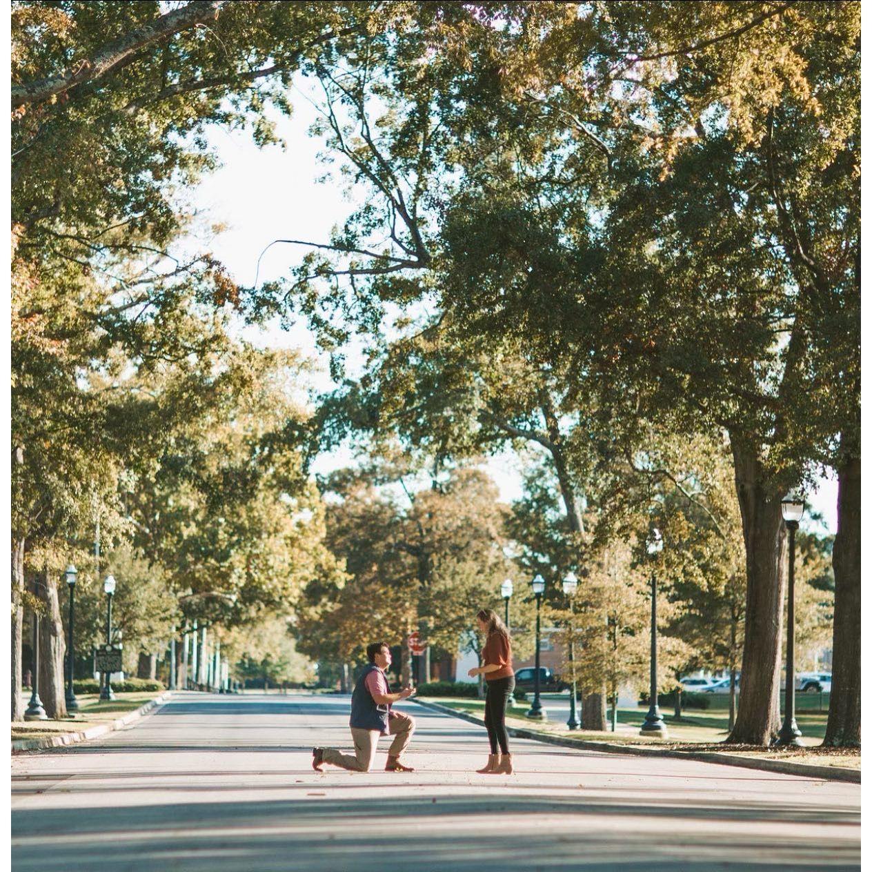 Brian proposed October 15th 2022 on a greenspace on the University of Alabama's campus, where we would spend a lot of our days together.
