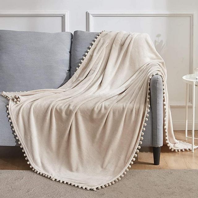 BEAUTEX Fleece Throw Blanket with Pompom Fringe, Beige Flannel Blankets and Throws for Couch, Super Soft Cozy Lightweight Plush Throw Blanket (50" x 60")