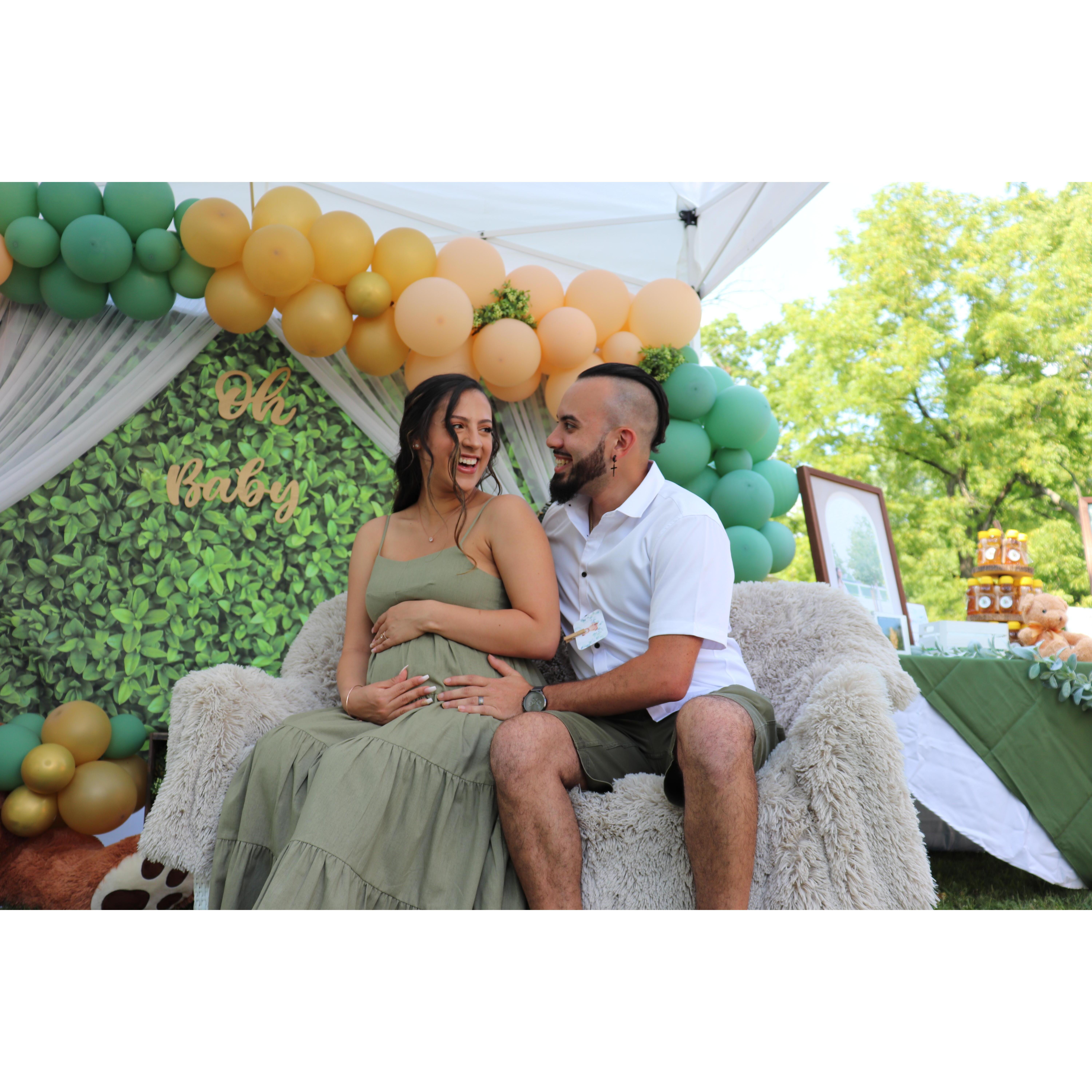 The proud parents-to-be at their son's baby shower. July 2021