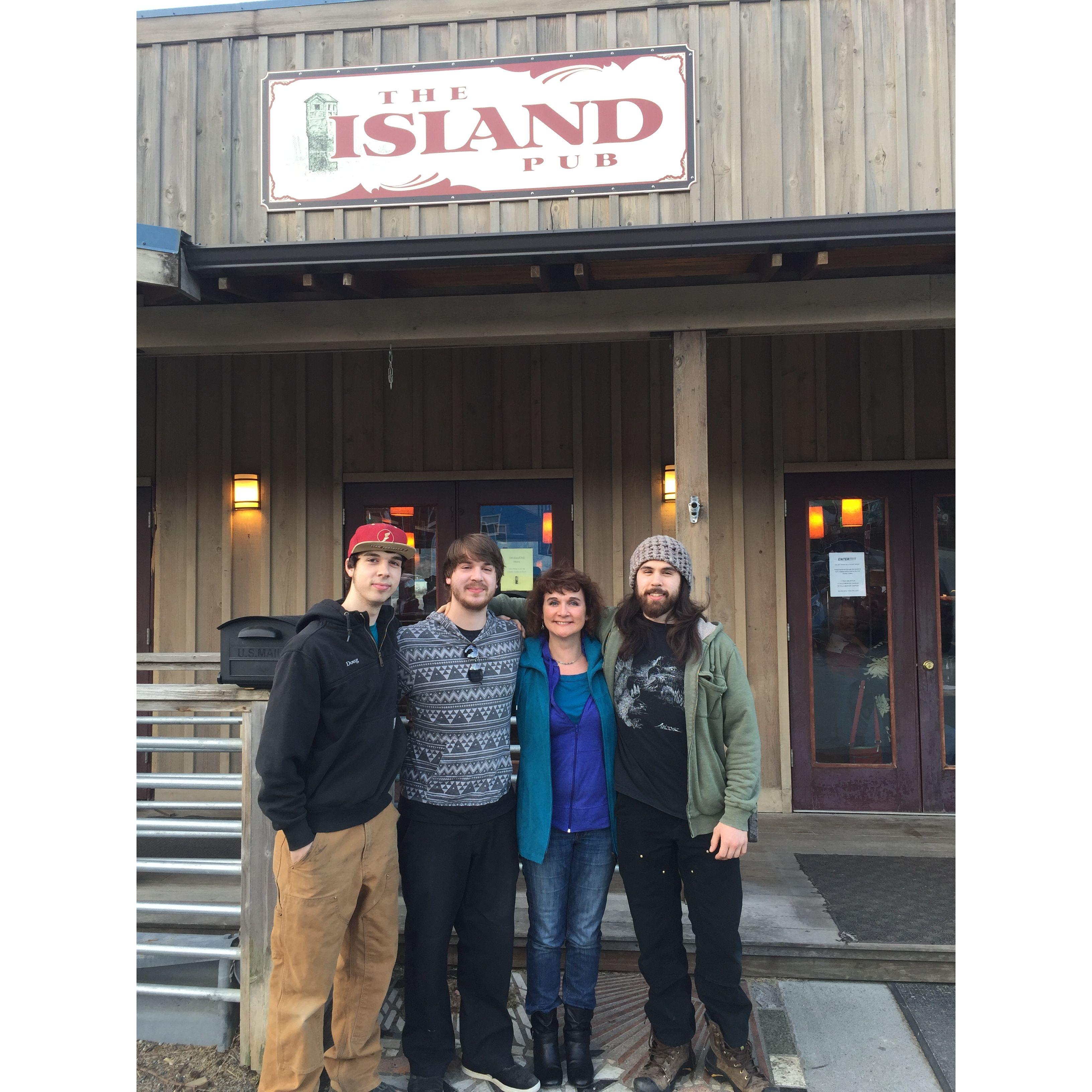Derek (far right) with his mom Amberly and two brothers Doug and Drake.
