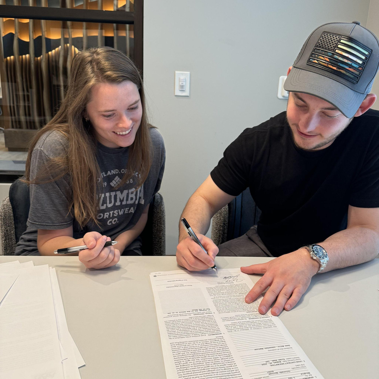 Signing the lease on our first place together... we were so excited!! -- September 2024