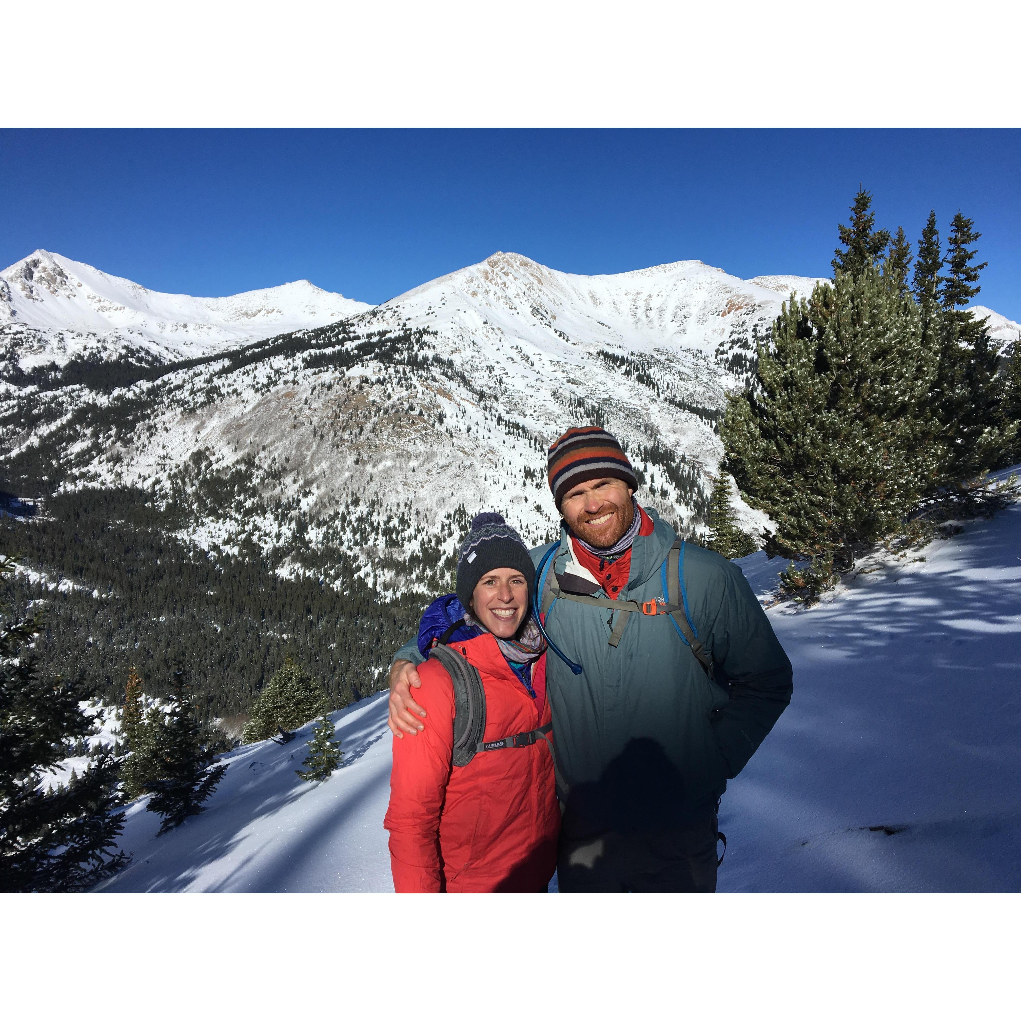 Huron Peak. Taken by a fellow hiker right after Johnny proposed. Couldn't feel our fingers but we each only need one to put the rings on