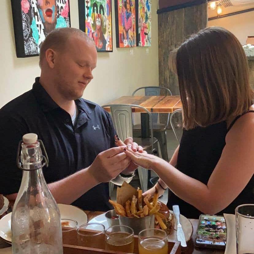 The proposal!
Steven proposed at a brewery called Caboose Brewing Company in Vienna, VA with a group of coworkers!