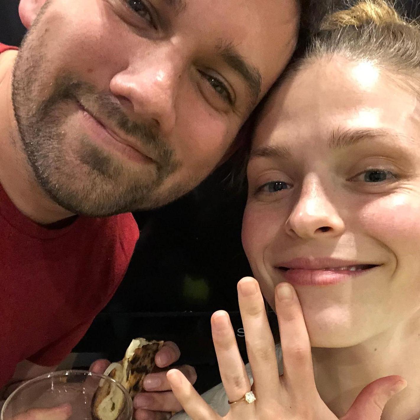 Celebrating our engagement with pizza.