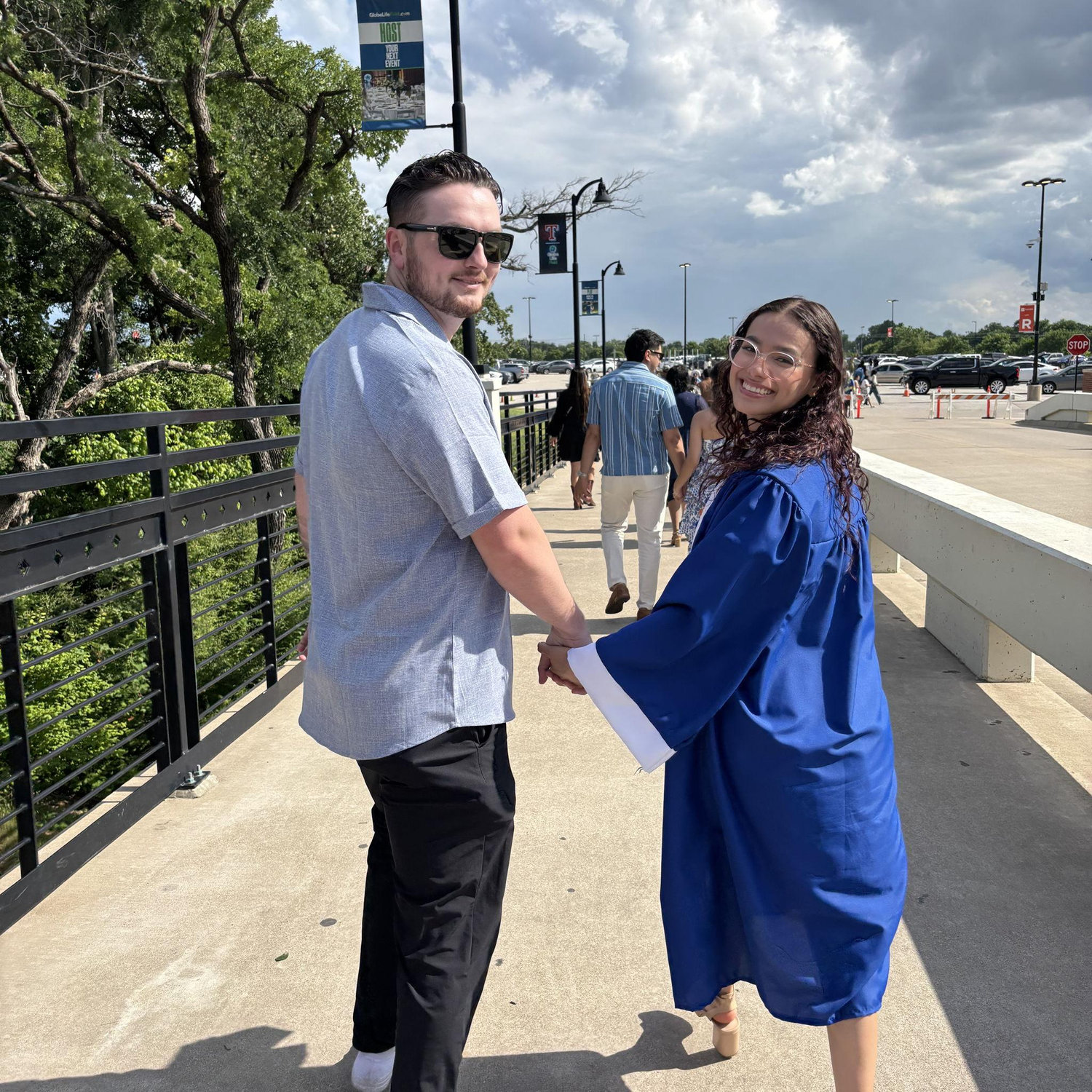My college graduation, recreating our high school graduation picture in TX 5/9/2025