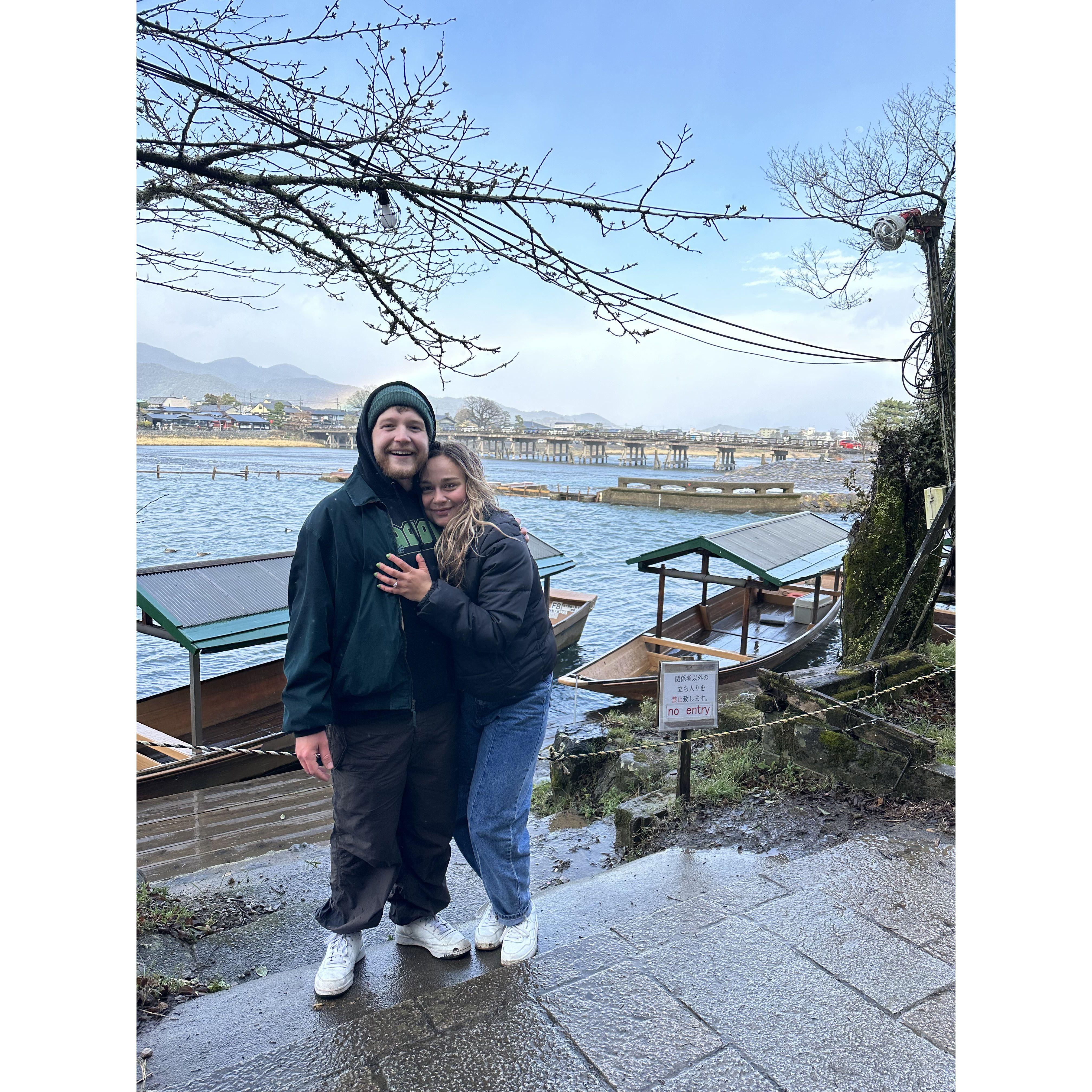 Moments after the engagement (freezing cold and soaked to the bone) under a cherry blossom tree with the Katsura river behind us with a rainbow over head