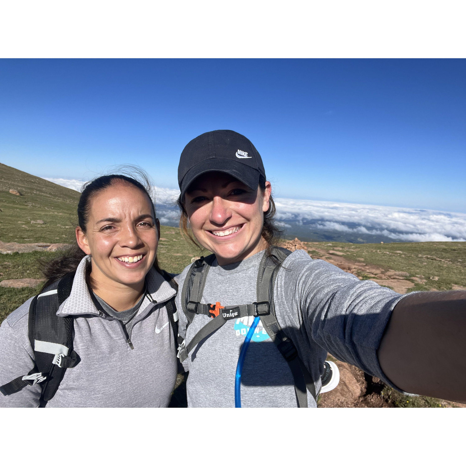 Hiking our first 14er together! Pikes Peak with donuts at the top.