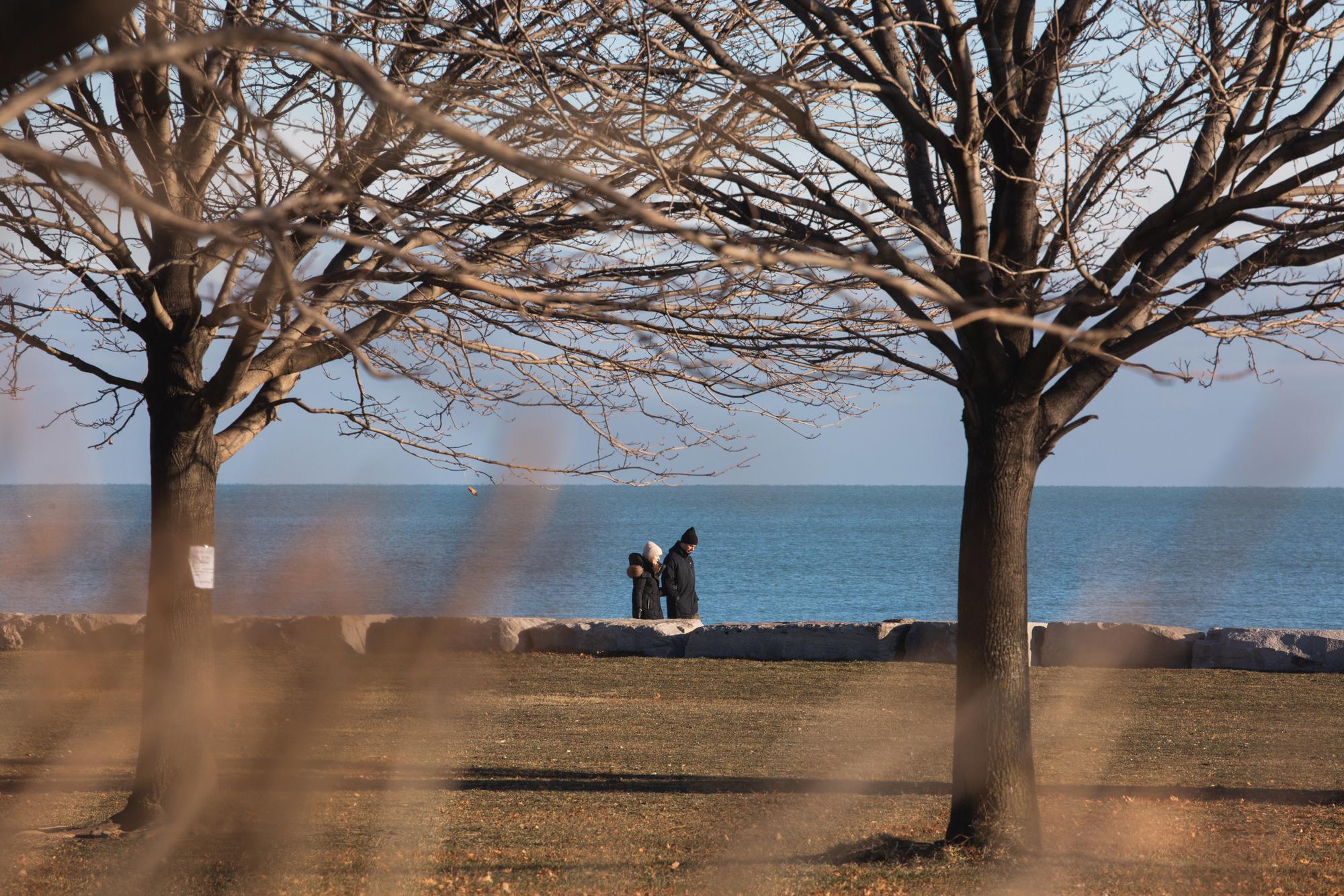The moment before Tom proposed. He took Alessandra on their regular morning walk on the Lakefront.
