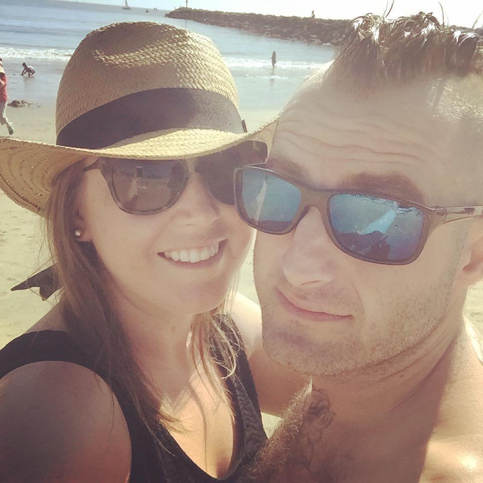 Joey and Cece relaxing at the beach in Corona del Mar, CA.